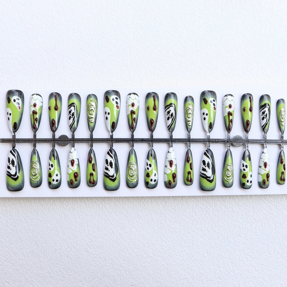 Artistic Press-On Nail Set with Unique Halloween Designs Stornfield