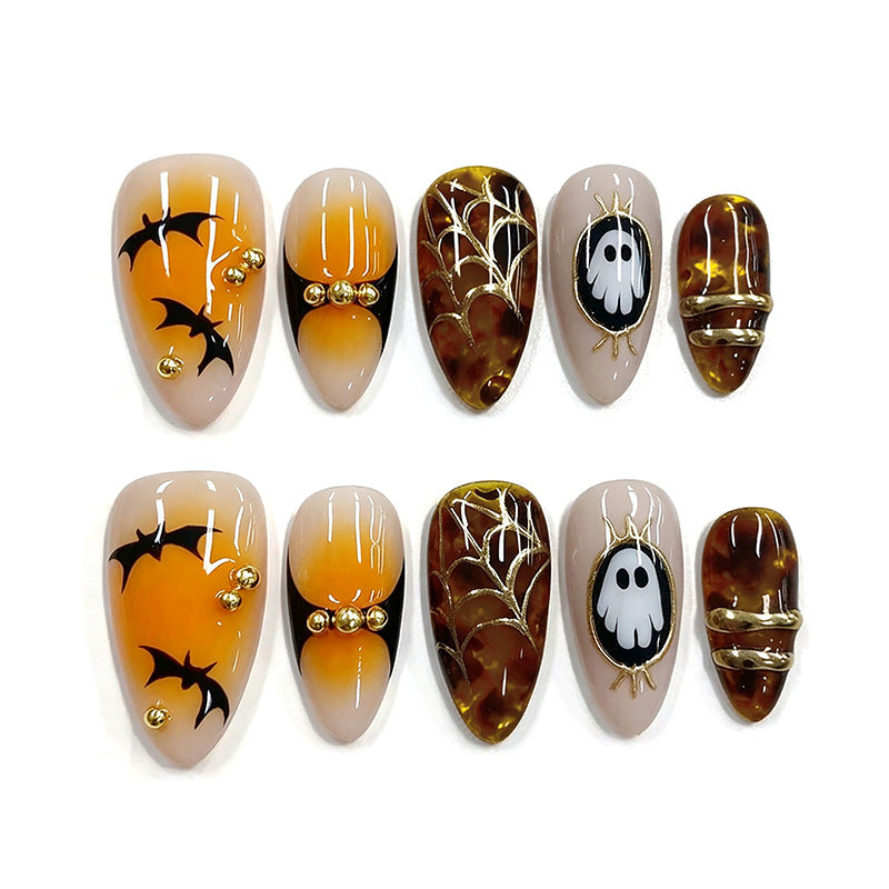Artificial nails with Halloween motifs and glitter details Stornfield