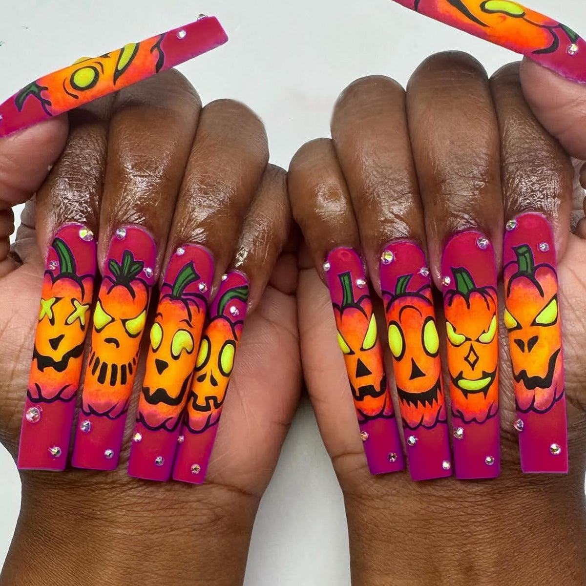Artistic Press-On Nails with Halloween Pumpkin Design Stornfield