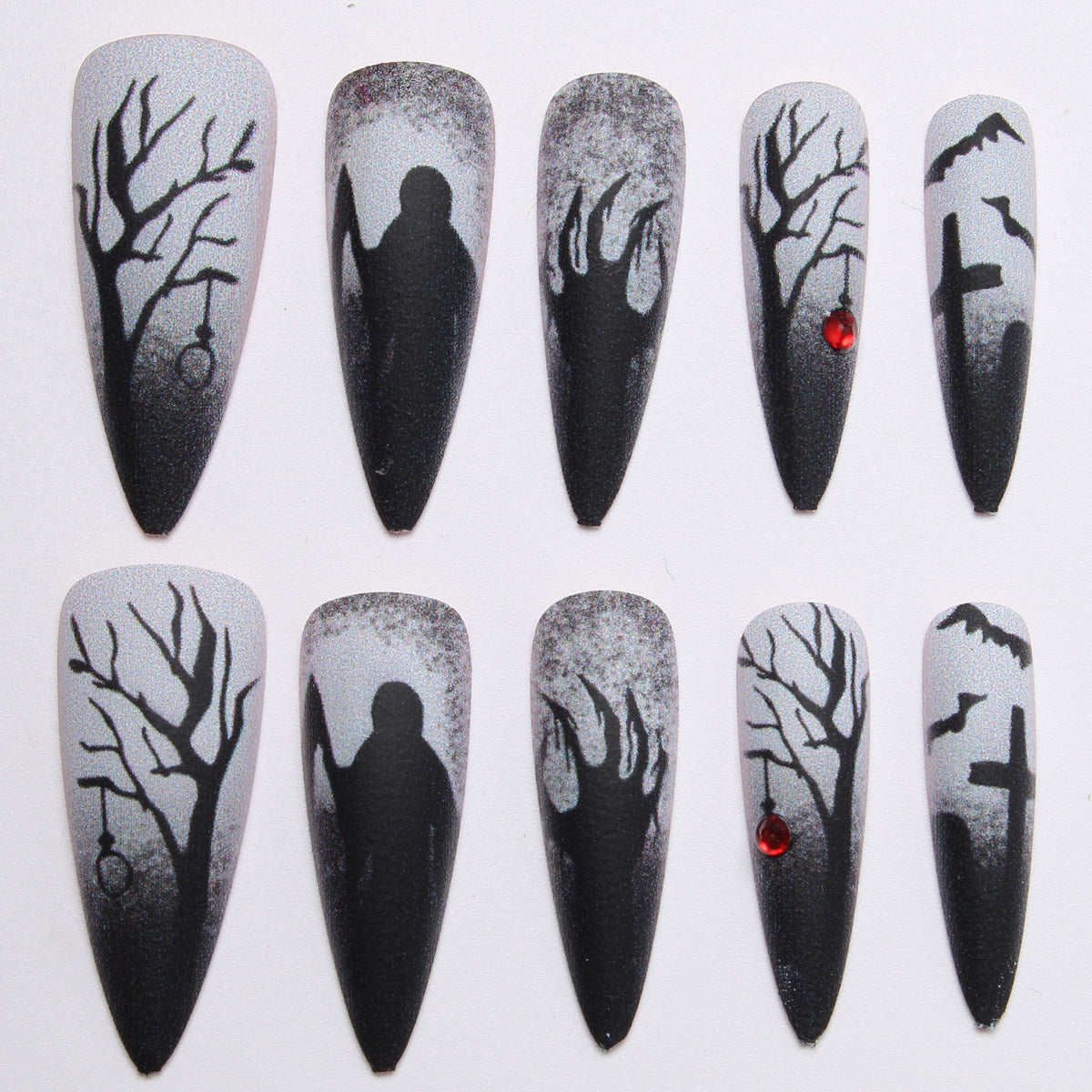 Creative press-on nails with a dark Halloween design Stornfield