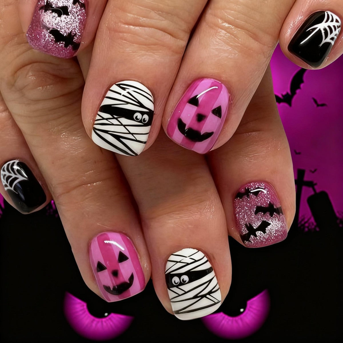 Creative nail art set with Halloween motifs and glitter accents Stornfield