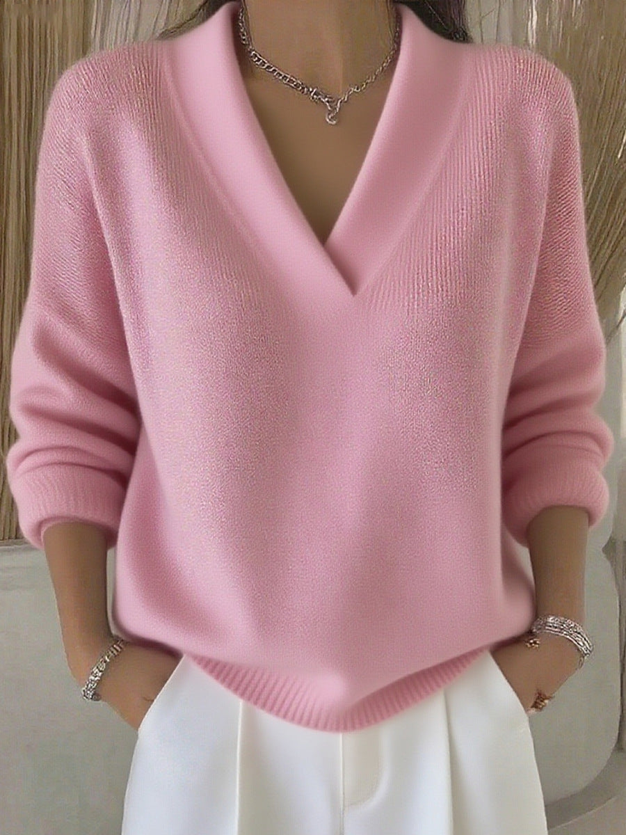 Relaxed Knit Sweater with Deep V-Neckline and Ribbed Hem
